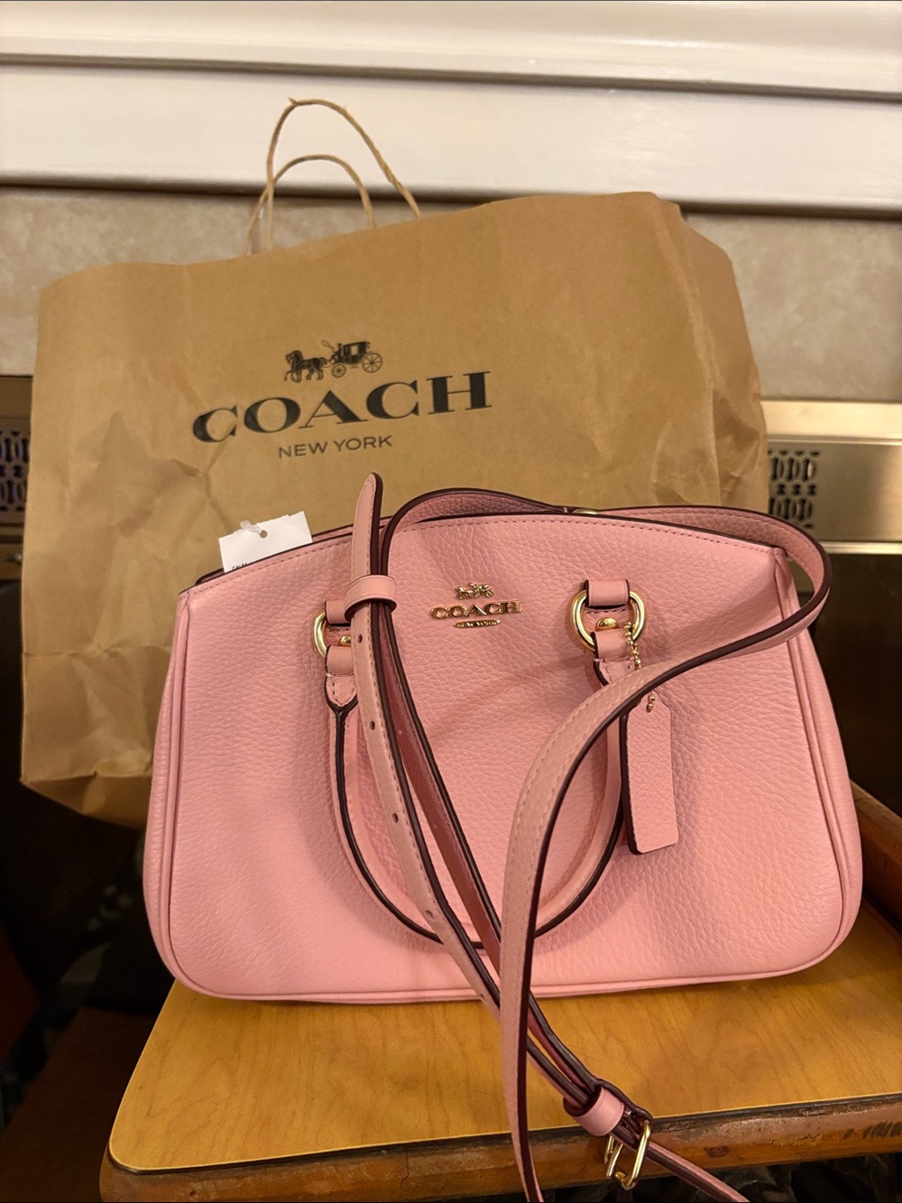 Coach Pink Pebbled Leather Mini Crossbody never used and brand new !
